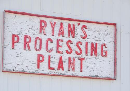 sign on the building - Ryan Processing Plant