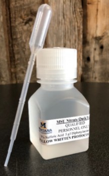 Figure 1 is a photo of a small plastic bottle and disposable syringe of the Nitrate QuikTest