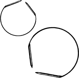 A black and white hand drawn image of circular needles